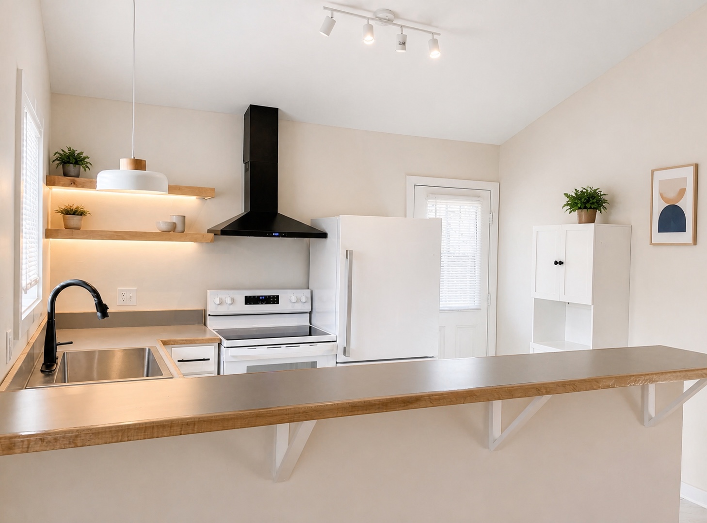 Kitchen with breakfast bar, floating shelves with under-shelf lighting, and pendant light (similar unit shown)
